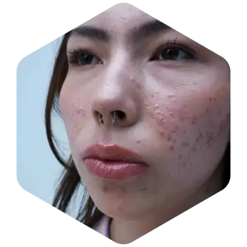 Animated image of a young woman smiling with a braid in her hair wearing a beige shirt